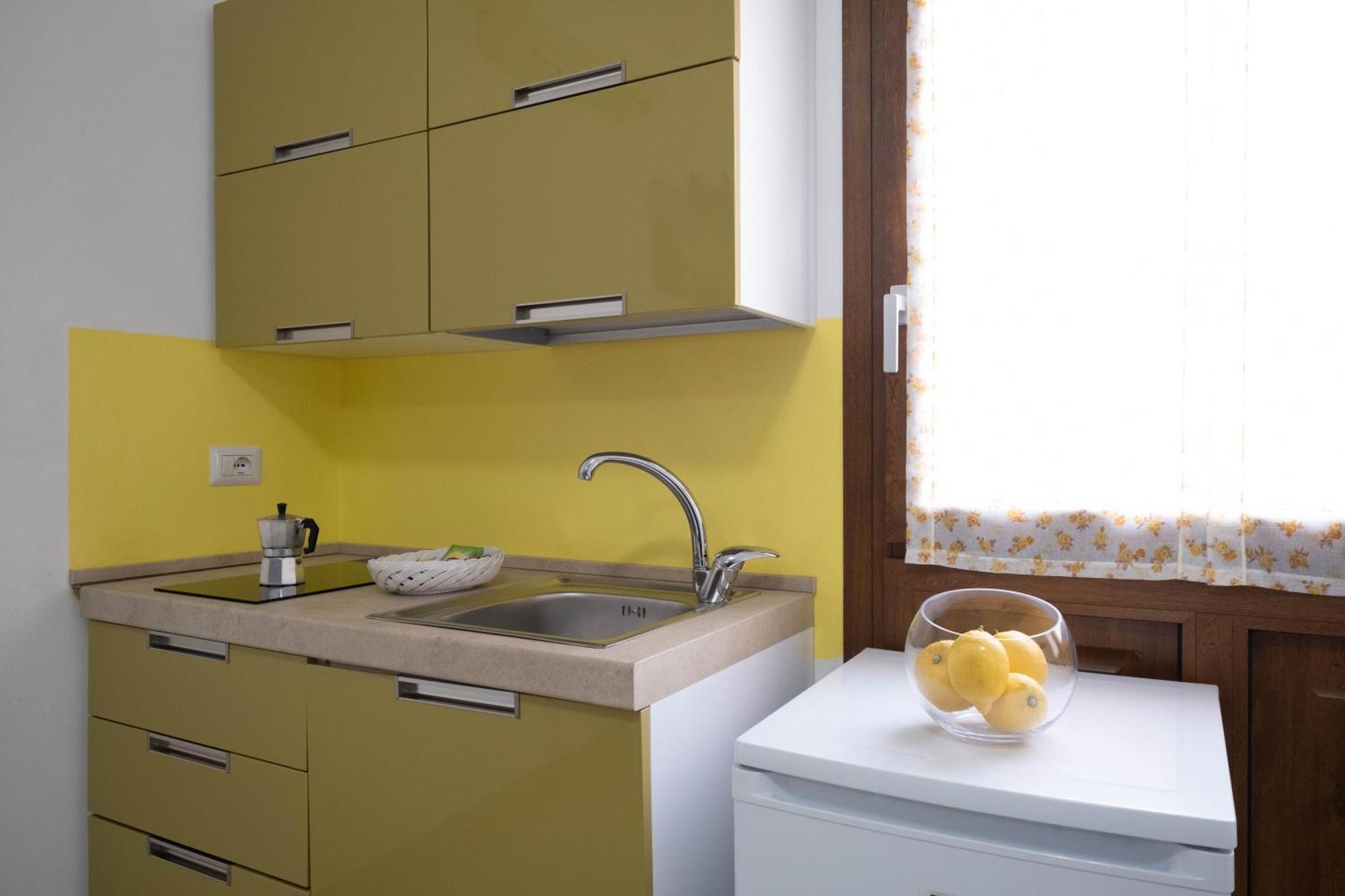 Appartamento Giallo 阿尔盖罗 外观 照片